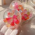 Balle anti-stress transparente avec glaçons colorés pour un jeu sensoriel apaisant - Balle de Glaçons Colorés