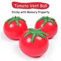 Close-up detail of tomato-shaped stress relief water ball squeeze toys with sticky texture - Red