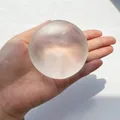 Translucent Vaseline soap squishy ball for stress relief, shown held in hand size. - 6cm white vaseline handmade ball [not maltose]