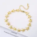 Elegant 18K gold plated five-pointed star bracelet featuring a minimalist and stylish design. - Style 10 (Model 10)