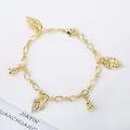 Elegant 18K gold plated charm bracelet with delicate leaf and gourd shaped pendants - Style 11 (Model 11)