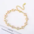 Elegant 18K gold plated bracelet featuring minimalist geometric micro-pave crystal design - Style 13 (Model 13)