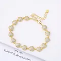 Elegant 18K gold plated heart link bracelet with sparkling pavé crystals and extender - Style 16 (Model 16)