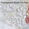 Dettaglio di un giocattolo squishy a zampa di gatto trasparente con stelle glitterate - Zampa di Gatto (Piccola)