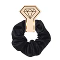 Close-up of black satin scrunchie on a decorative diamond-shaped display card. - Black (satin Khaki)