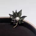 Elegant maple leaf brooch with pearl center and sparkling black finish - Black Maple Leaf Style (XZ160)