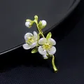 Elegant green flower branch brooch with white enamel petals and yellow crystal centers - Flower Branch Style (XZ216)