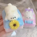 Lindos juguetes antiestrés de conejo y oso de dibujos animados en colores pastel - Panda acostado