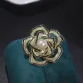 Elegant rose brooch with pearl and rhinestones in gold and black finish on velvet stand - Vintage Black & Gold Rose Style (XZ243)
