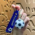 Blue soccer ball keychain with 'Football' silicone strap for sports fans - Football