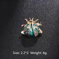 Broche coccinelle dorée avec cristaux bleus accessoire de mode femme - Style Coccinelle Bleue (XD8200 Bleu)