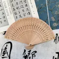 Classical hollow carved wooden folding fan with celestial star and moon patterns for gifts - Moon & Star