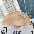 Elegant hollow-out sandalwood folding fan for women, classical wedding style - Honeycomb