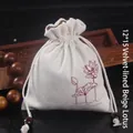 Pochette à bijoux en molleton beige avec cordon de serrage et imprimé lotus 12x15cm - 12x15cm Doublé de Velours / Lotus Beige