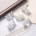 Macro view of clear candy-shaped hand-painted beads for DIY jewelry making projects - Price per Piece / Transparent + White