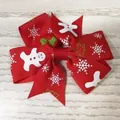 Festive red Christmas hair bow for girls featuring white gingerbread man and snowflake prints - Red Gingerbread Man Snowflake Style(23)