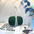 Elegant green velvet evening clutch bag with sparkling rhinestone ring handle for gala. - 19cm x 6cm x 12cm / Green