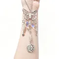 Exquisite butterfly suncatcher with crystal prisms and celestial moon sun charms - Opalite (Synthetic)