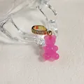Pendentif ourson en gomme rose translucide avec bélière dorée en micro-pavé en résine de qualité - Ours Rose Rouge