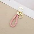 Handcrafted pink braided leather keychain with elegant gold-toned hardware for car keys - Generation 1 Round Dragon Woven Buckle (Light Gold) / Light Pink
