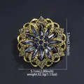 Elegant vintage blue crystal flower brooch with gold metal filigree detail - Ink Blue & Grey Diamond with Ink Blue Glass Retro Flower