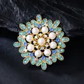 Elegant vintage floral brooch with pearls and blue glass rhinestones in golden finish - Light & Lake Blue with AB White & Beige Artificial Pearl