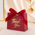 Elegant burgundy wedding candy box with gold 'Thank You' print and red satin ribbon bow. - Small (11.5x10x4.5cm) / Wine Red THANK YOU (Wine Red Ribbon)