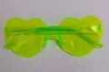 Neon green heart-shaped rimless sunglasses with vibrant candy jelly texture for party wear - Fluorescent Yellow