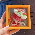 Handmade red crochet flower bouquet keychain presented in a yellow gift display box - Red Rose (with Floating Case)