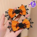 Lot de 2 barrettes à cheveux Halloween avec nœuds orange et toiles d'araignée noires - Nœud pour cheveux / 2 Pièces/Ensemble / Orange