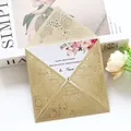 Detail shot of a glitter gold laser-cut wedding invitation with lace patterns - Light Gold Glitter