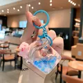 Adorable pink pig quicksand keychain with blue liquid glitter and secure ring charm - Piggy Doll Quicksand Bottle / Blue