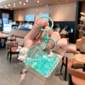 Cute cartoon rabbit liquid keychain charm in mint green with blue heart glitter beads - Animal House - Rabbit / Green
