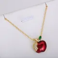 Elegant red apple fruit pendant necklace featuring gold finish and shimmering crystal accents - Enamel Red Apple Necklace (xl2)