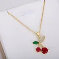 Exquisite cherry fruit pendant necklace featuring vibrant red and green gemstones in gold finish - Pave Zirconia Cherry Necklace #5 (xl2)