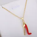 Elegant gold high heel shoe pendant necklace featuring signature red bottom charm - Red Sole High Heels Necklace (xl2)