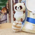 Adorable plush raccoon keychain accessory hanging as a charm on a stylish backpack - Round Bead Chain / Beige