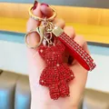 Sparkling red rhinestone bear keychain with matching wrist strap for car keys. - Red