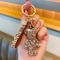 Sparkling champagne gold rhinestone teddy bear keychain with a matching glitter strap - Champagne