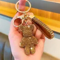 Sparkling golden rhinestone bear keychain with crystal-studded strap for car bags - Gold