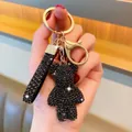 Luxury sparkling black rhinestone bear keychain bag charm with premium gold hardware - Black