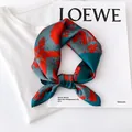 Elegant silk square scarf with a retro red sunflower print on a deep teal background - 17211 - Main Image / 53*53cm