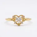 Close-up of heart-shaped 18K gold plated ring with micro-set sparkling zircons - Gold
