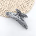 Detailed macro view of starfish hair claw clip with marble texture and black rhinestones - Graphite Gray (Black Rhinestone)