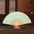 Handmade mint green 6-inch blank paper folding fan with carved wooden ribs for DIY painting - Light Green
