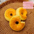 Juguete de donut de pan de simulación de PU de crecimiento lento con marcas de mordida - Pan Mordido