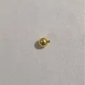 Vista dettagliata di una chiusura magnetica tonda placcata oro 14k per gioielli fai da te - Rotondo Liscio / 12mm / Oro