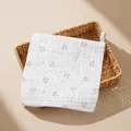 Soft six-layer cotton gauze baby washcloth with cute puppy print on wicker basket - Happy Puppy