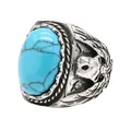 Vintage stainless steel skull ring with a large oval blue turquoise gemstone inlay - Blue