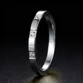 Elegant silver titanium steel ring for women featuring three inlaid clear zircon stones - US 5